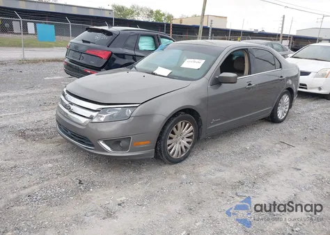 2010 Ford Fusion Hybrid из США, поврежденный, VIN 3FADP0L31AR326917